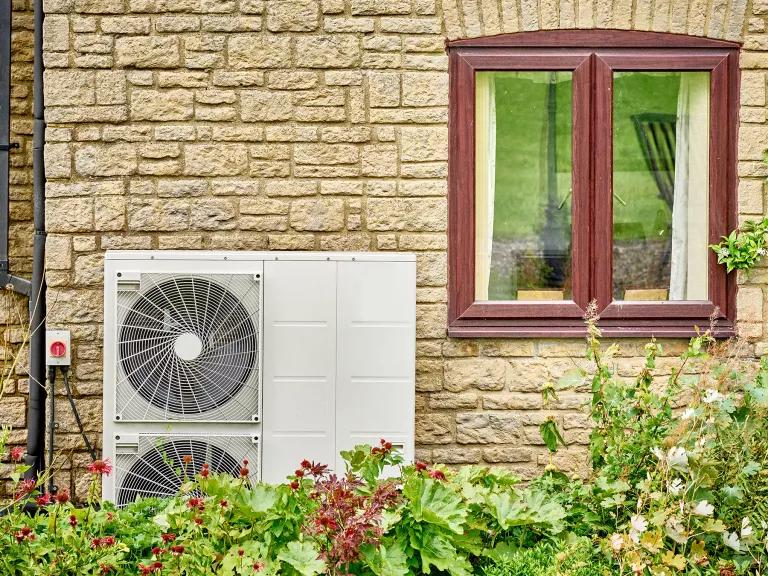 A heat pump installed outside of a house