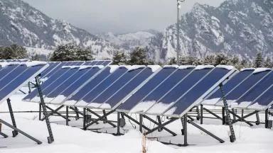 Snow melting off a photovoltaic solar panel array at the National Wind Technology Center (NWTC) in Boulder, Colorado, on November 11, 2017.